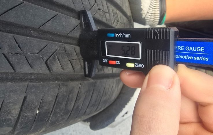 Digital gauge reading on a Grade B tire